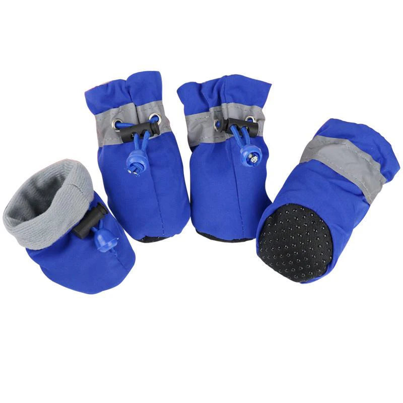 Bottes pour chiens de couleurs bleu avec rembourrage gris. Les bottes servent pour les périodes hivernales. Image produit Boutiquechien