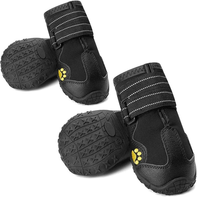 Bottes pour chiens de couleurs noir avec des pattes jaunes. Image produit Boutiquechien