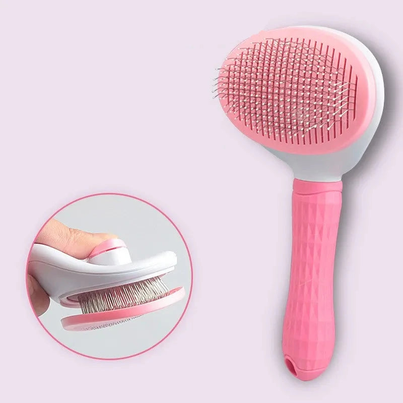 Brosse pour chien de couleur rose et blanc avec un poussoir poil de boutiquechien