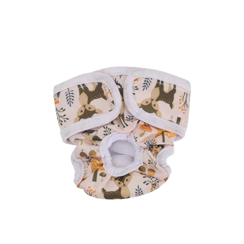 Couche pour chien de couleur beige avec des fan dessus. Image produit Boutiquechien