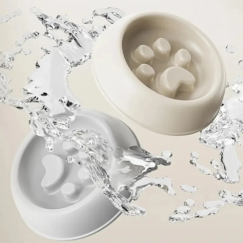 Gamelle chien anti glouton en forme de patte de couleur gris et blanc. Image produit Boutiquechien
