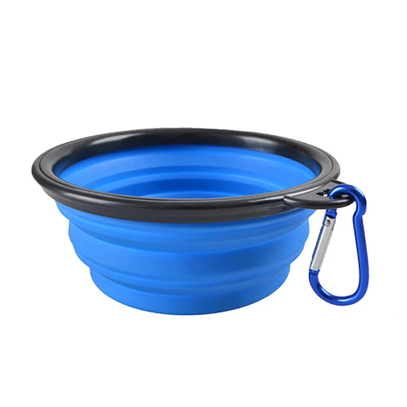Gamelle pour chien de couleur bleu pliante transportable facilement dans un fond blanc. Image produit Boutiquechien