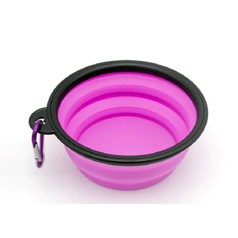 Gamelle pour chien de couleur violette pliante transportable facilement dans un fond blanc. Image produit Boutiquechien