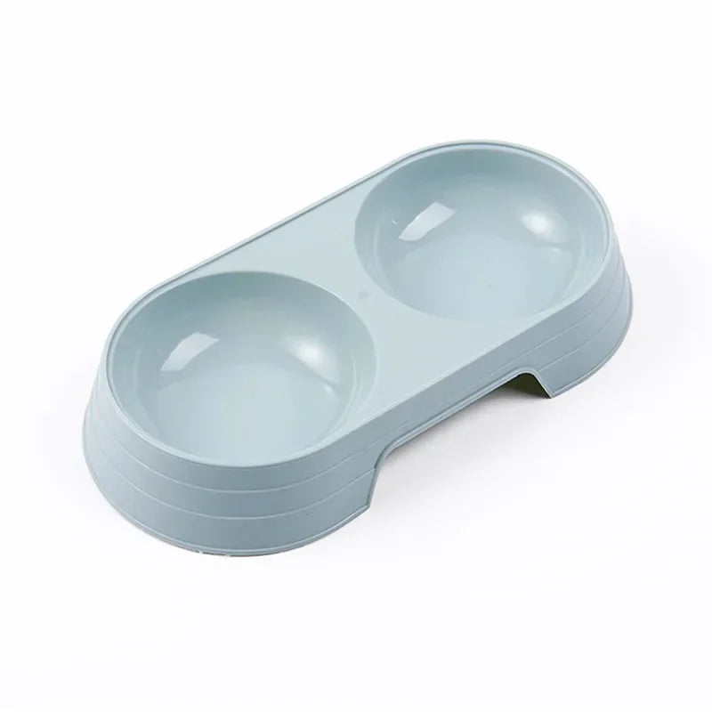 Gamelle en plastique pour chiot de couleur bleu. Petit gamelle double de couleur bleu pour les chiots. Image produit Boutiquechien