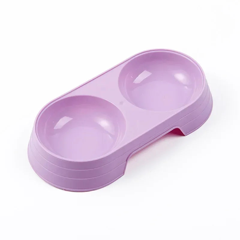 Gamelle en plastique pour chiot de couleur violet. Petit gamelle double de couleur violet pour les chiots. Image produit Boutiquechien