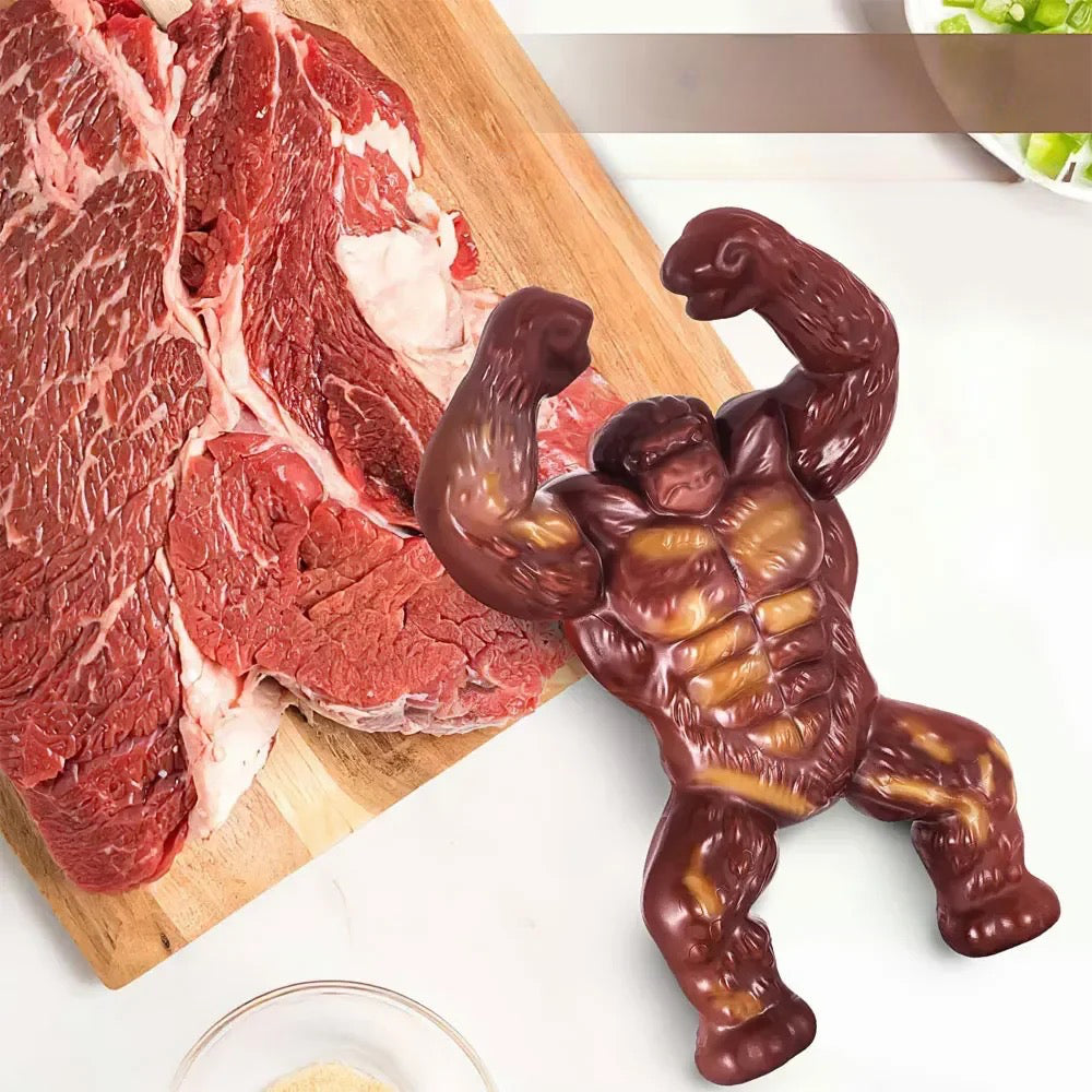 gorille à coté de viande sur une table de cuisine. Image produit Boutiquechien