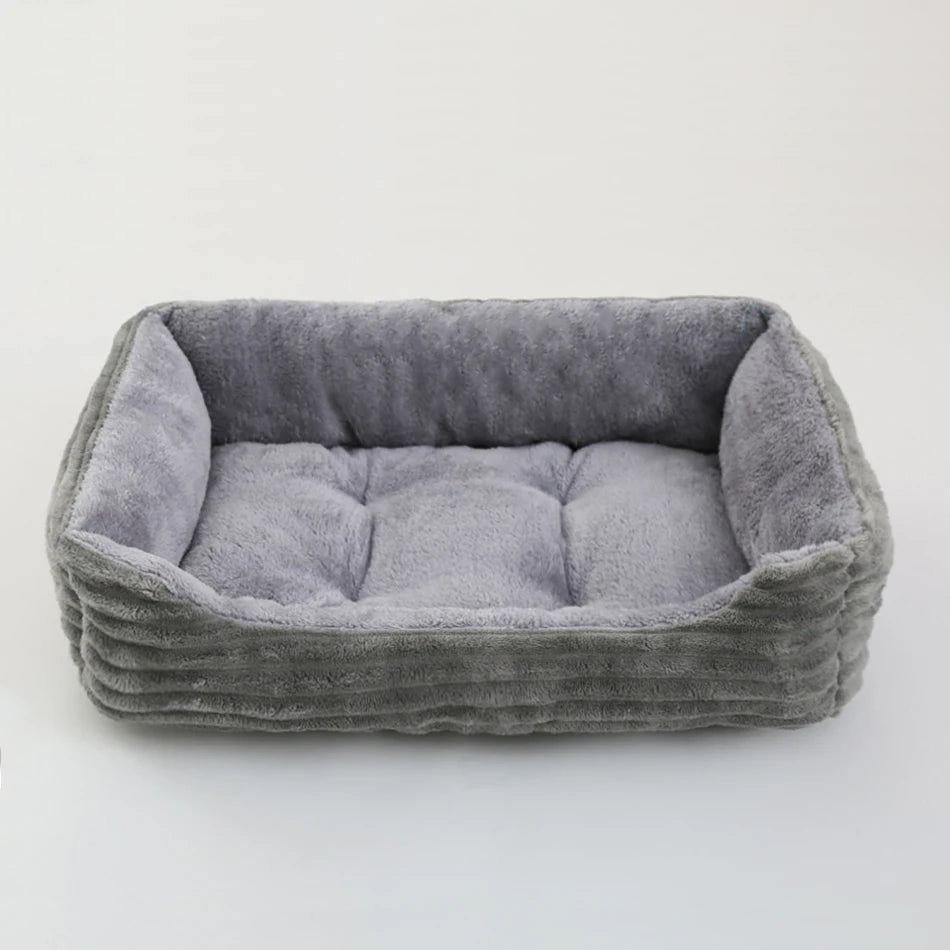 Grand panier pour chien XXL gris rembourré pour un moelleux de qualité supérieur. Panier style velour classe pour grand chien. image produit boutiquechien