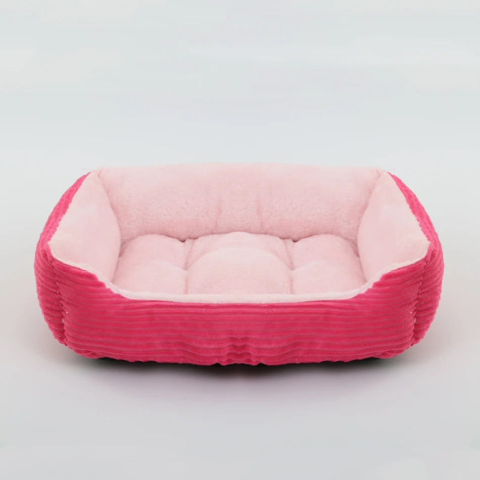 Grand panier pour chien XXL rose et rose clair rembourré pour un moelleux de qualité supérieur. Panier style velour classe pour grand chien. image produit boutiquechien