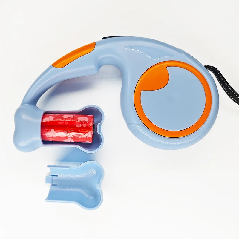 Laisse enrouleur bleu et orange avec protection de sachet à crotte. Image produit Boutiquechien