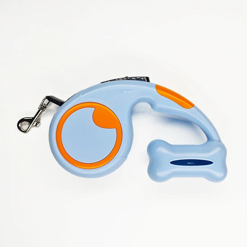 laisse enrouleur de couleur orange et bleu avec sachet à caca. Image produit Boutiquechien