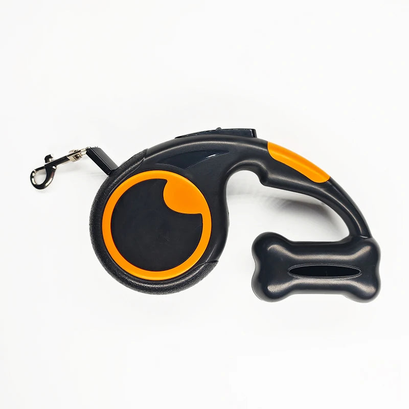 Laisse enrouleur noir et orange avec protection à sachet à caca. Image produit Boutiquechien