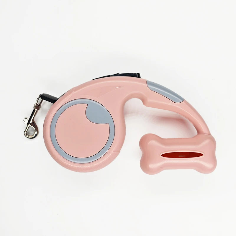 Laisse enrouleur bleu et rose enrouleur avec protection de sachet à crotte. Image produit Boutiquechien