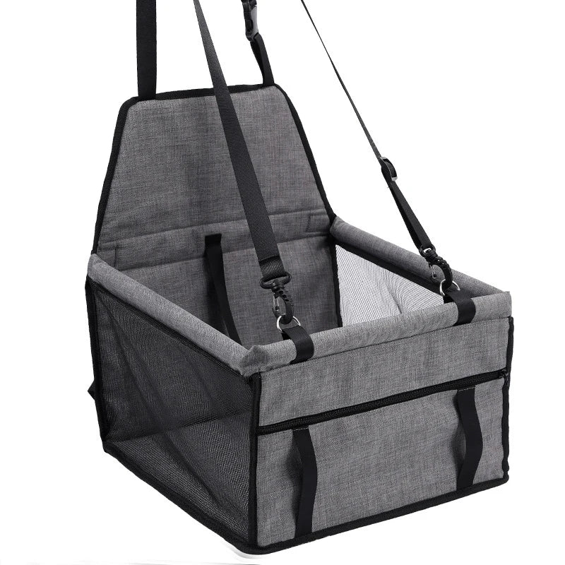 Panier de transport pour chien de couleur gris avec de nombreuses sangle d'attache. image produit Boutiquechien