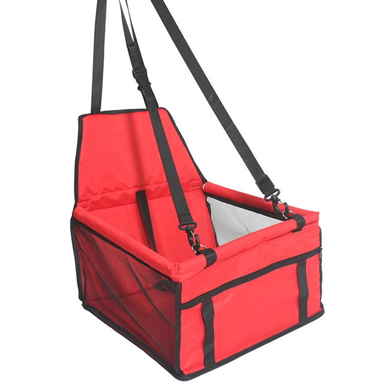 Panier de transport pour chien de couleur rouge avec de nombreuses sangle d'attache. image produit Boutiquechien