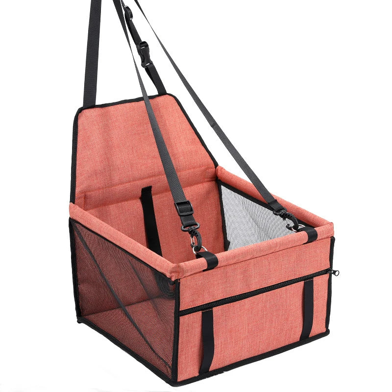 Panier de transport pour chien de couleur saumon avec de nombreuses sangle d'attache. image produit Boutiquechien
