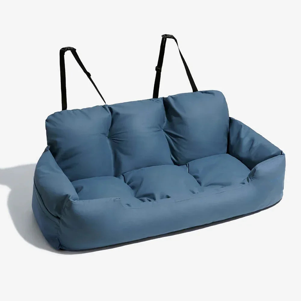 Panier de transport pour chien de couleur bleu foncé pour transport son chien confortablement avec ses coussins moelleux et ses trois laisses de sécurité. Image produit Boutiquechien