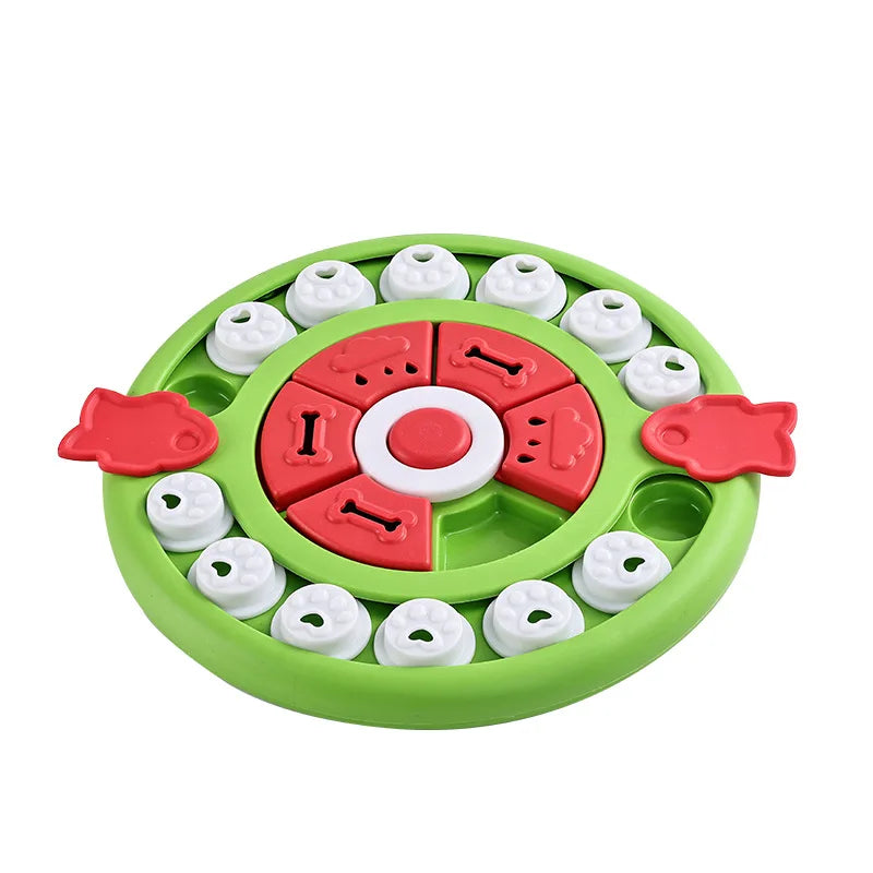 Puzzle pour chien de couleur vert et blanc avec des rappels rouge dessus. Le puzzle est circulaire et possède de formes de poissons de couleur rouge. Image produit boutiquechien