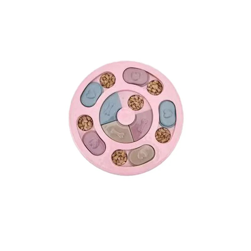 Puzzle pour chien de couleur rose de forme circulaire. Le puzzle possède de nombreux compartiment pour cacher les friandises. Image produit Boutiquechien
