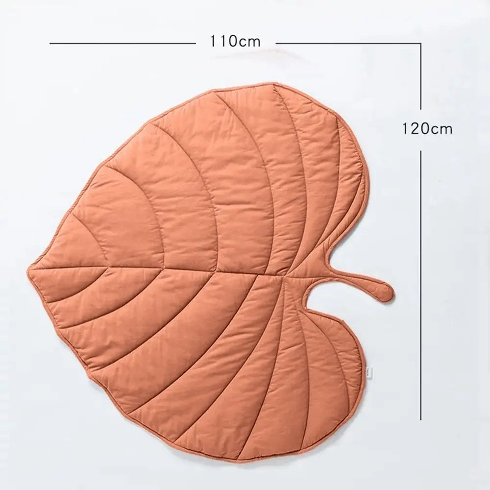 Tapis chien de couleur pêche en forme de feuille design et élégant. Dimension total du produit de 110CM de long sur 120Cm de large. Image produit Boutiquechien
