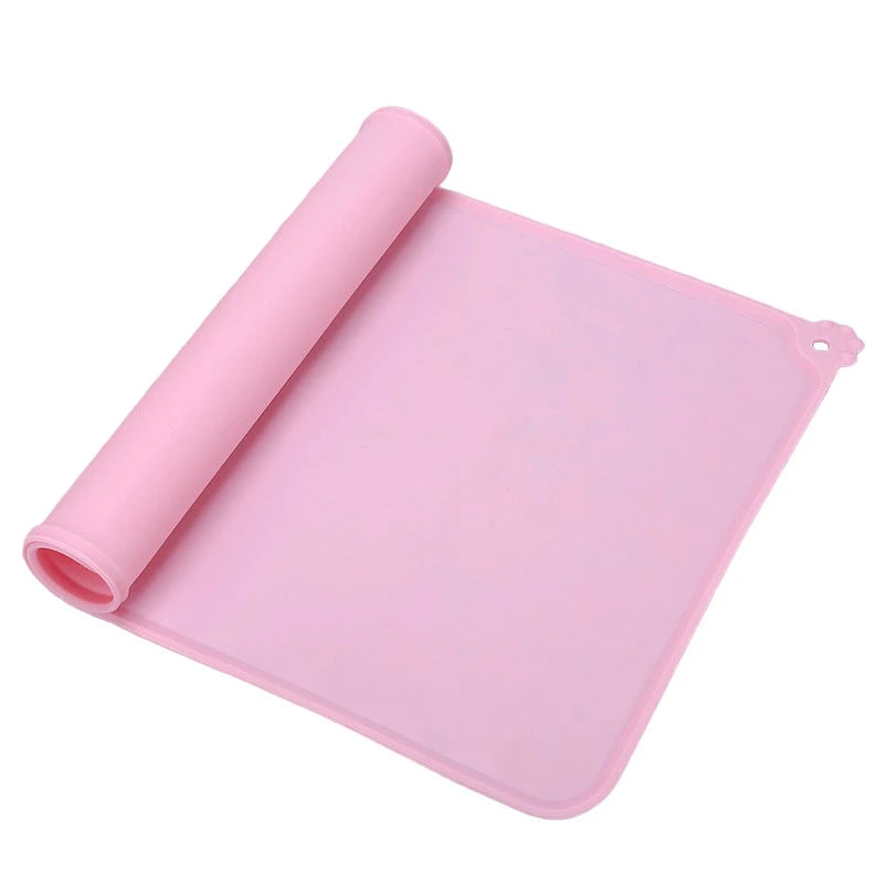 Tapis chien rose pour gamelle en caoutchouc résistant et durable. Image Roduit Boutiquechien