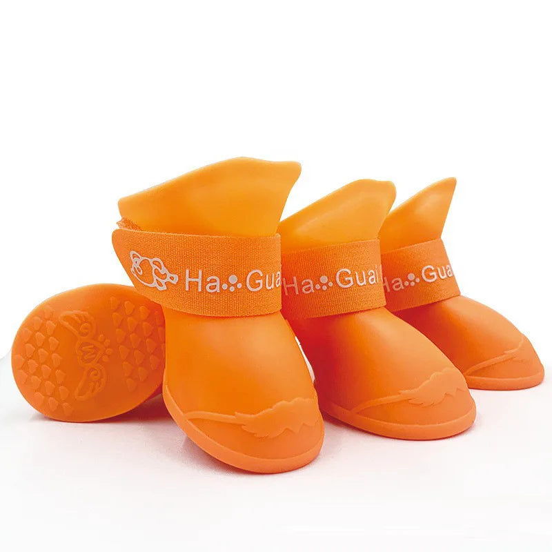 Bottes pour petits chiens de couleurs orange en caoutchouc imperméable. Image produit Boutiquechien