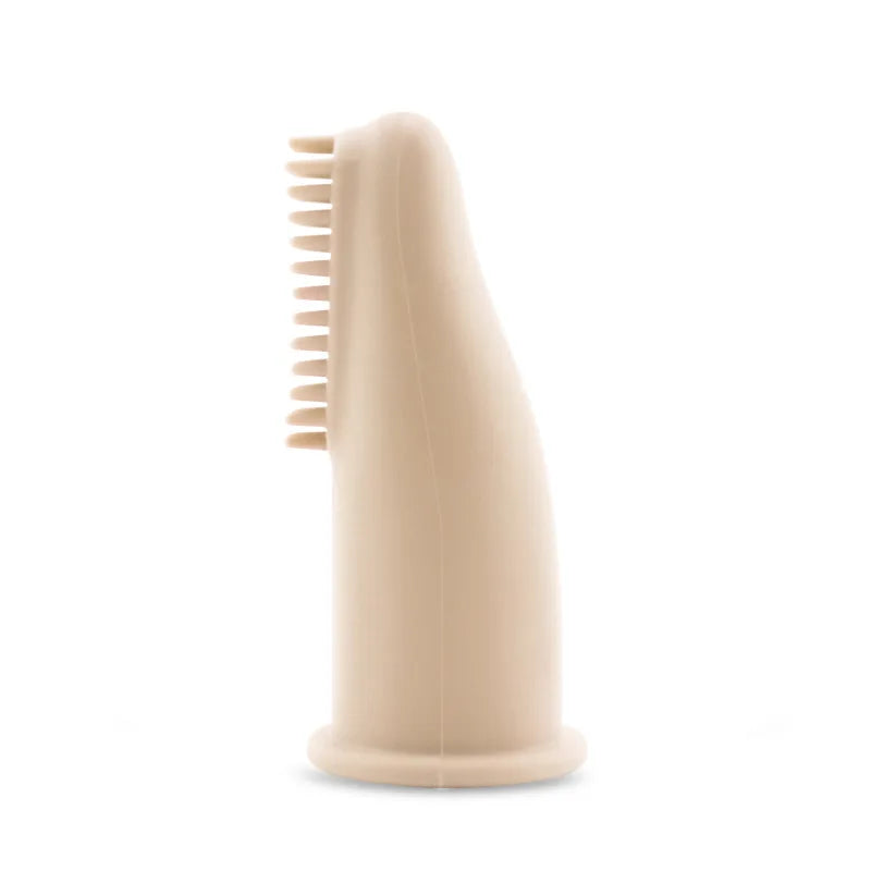 Brosse à dent pour chien de couleur jaune claire saumon claire à mettre au bout de son doigt pour brosser les dents de son chien. Image produit Boutiquechien