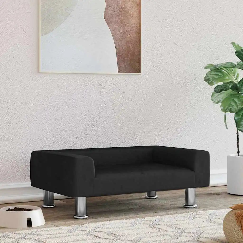 canapé chien de couleur noir avec des pieds chromé gris. Sur le côté il y a une plante verte. Image produit Boutiquechien