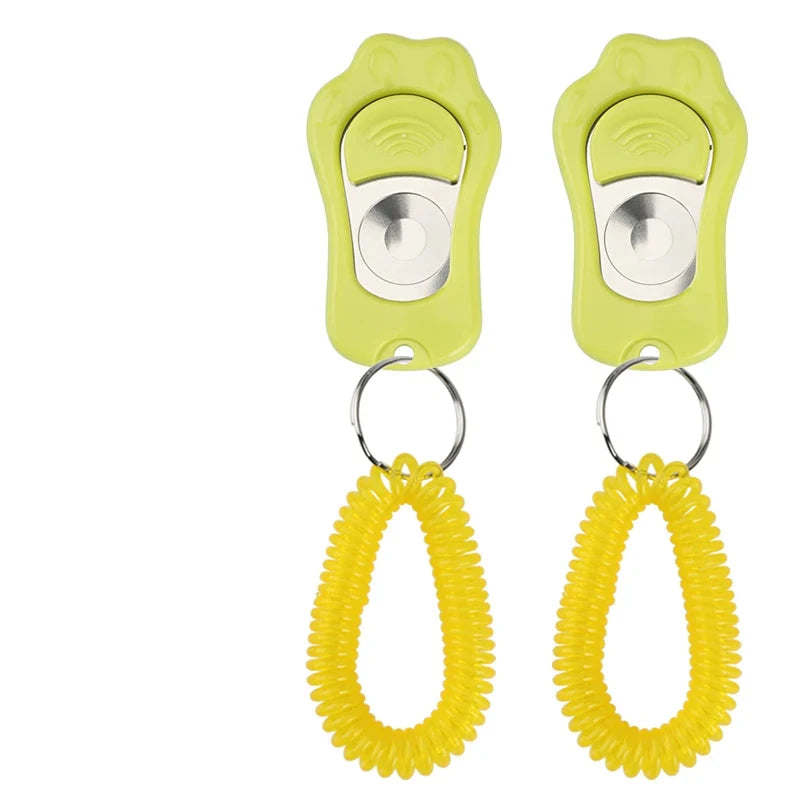 Clicker pour chien rouge avec maintien vert pour les chiens. Image produit Boutiquechien