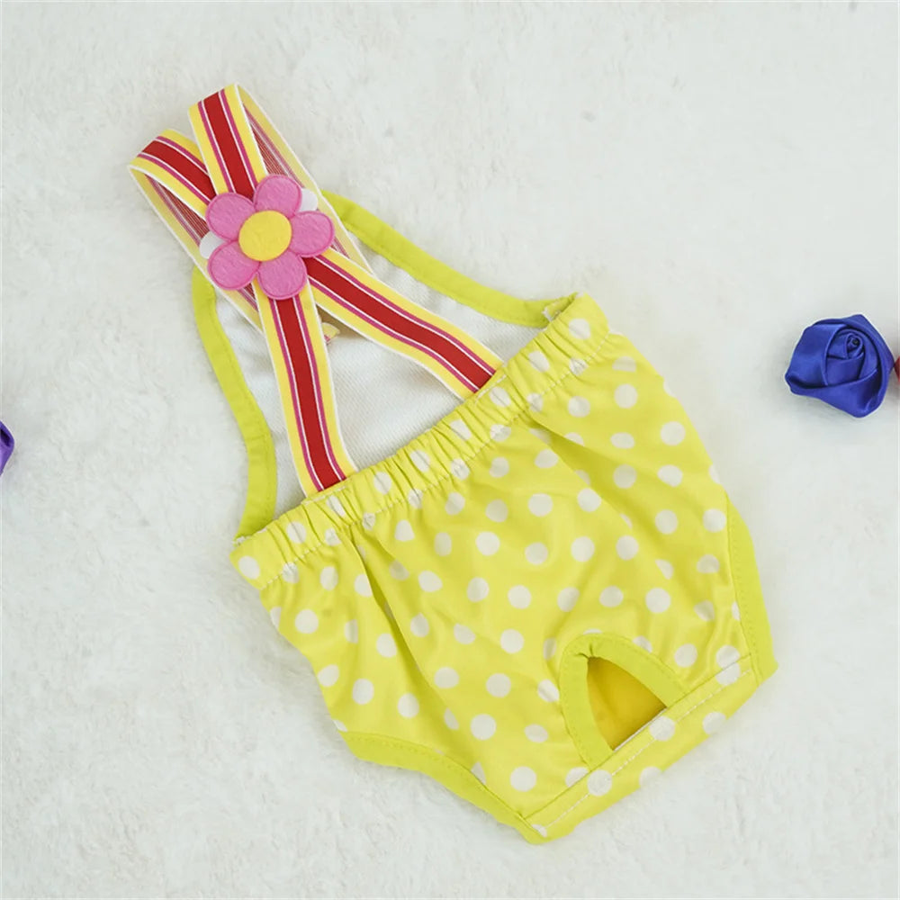 Couche à bretelle pour chien de couleur jaune et blanc avec des formes de rode. Le produit est posé dans un fond blanc. Image produit Boutiquechien