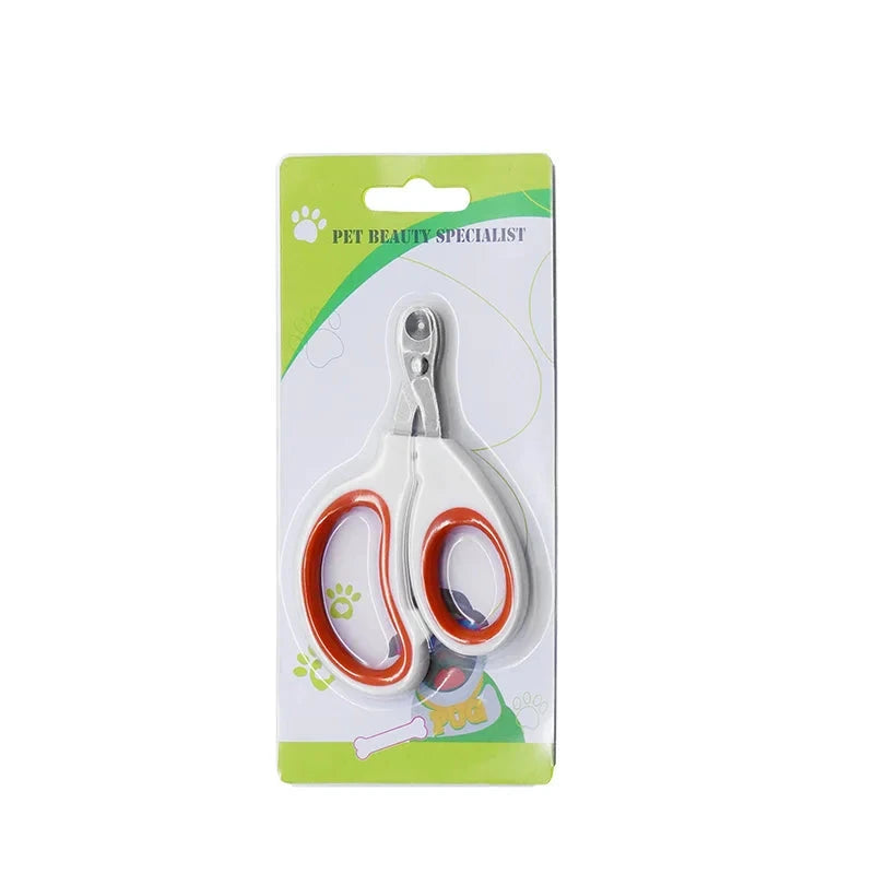 Coupe ongle pour chien de couleur blanc et orange dans un carton. Image produit Boutiquechien