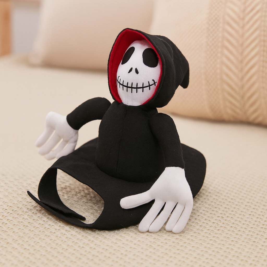 Déguisement noir et blanc de la faucheuse posé sur un canapé blanc. image produit boutiquechien