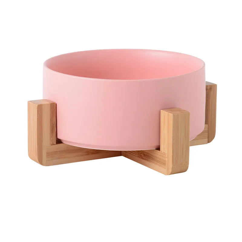 Gamelle en céramique rose pour chien avec support en bois. Image produit Boutiquechien