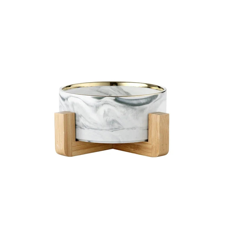 Gamelle pour chien de couleur grise et or avec support bois. Image produit Boutiquechien