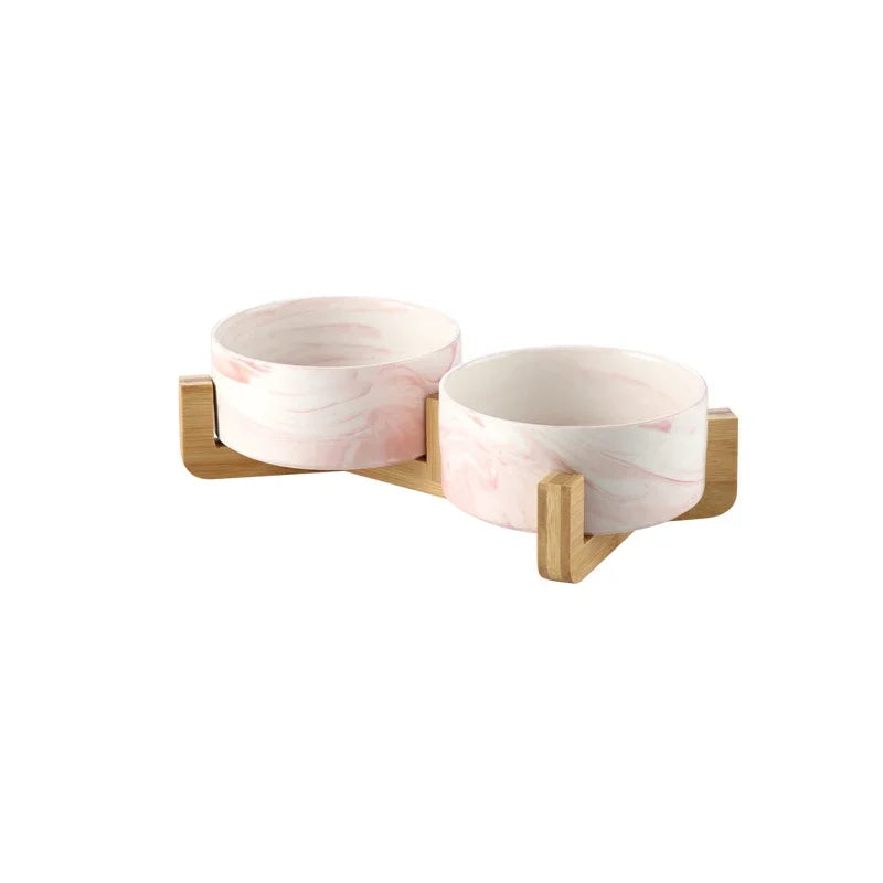 Gamelle double pour chien de couleur rose avec support bois. Image produit Boutiquechien