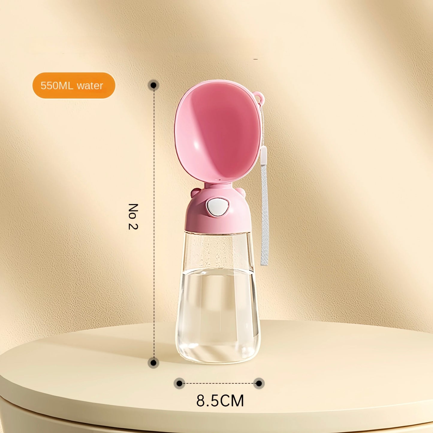 gourde d'eau pour chien de couleur rose avec une capacité de 550 ml d'eau. le produit possède des dimensions du produit. Image produit Boutiquechien