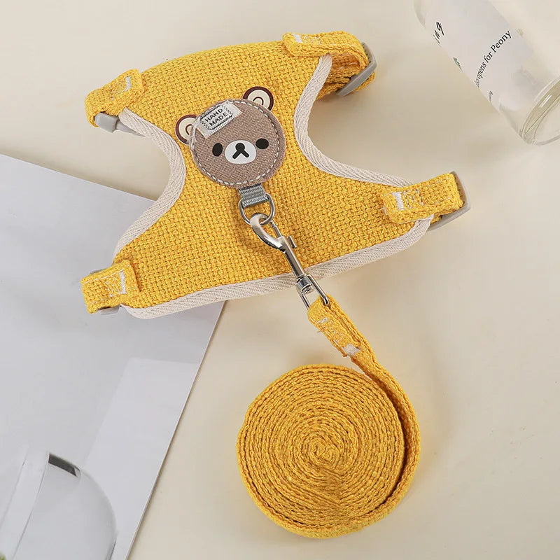 Harnais chien de couleur jaune avec ourson de couleur gris. Image produit Boutiquechien