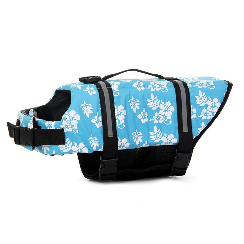 harnais de sauvetage pour chien bleu avec formes de pattes avec des plantes blanches. Sur un harnais il y a une poignée de couleur noir avec des sangles noir. Image produit Boutiquechien