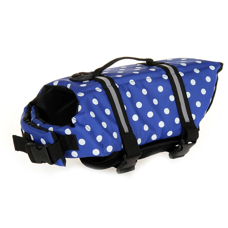 harnais de sauvetage pour chien bleu et blanc avec des points blanc. Sur un harnais il y a une poignée de couleur noir avec des sangles noir. Image produit Boutiquechien