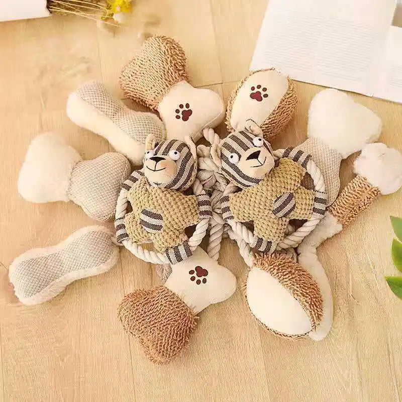 peluche chien de couleur claire posé les uns sur les autres. Image produit Boutiquechien