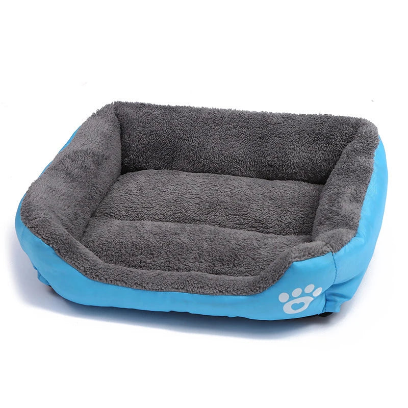 panier bleu pour chien de grande taille avec une patte sur le côté. Image produit pour boutiquechien