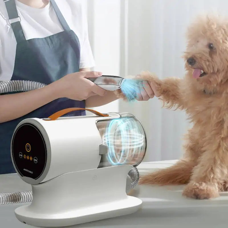 plusieurs pro pour chien silencieux de couleurs blanc. Le pulseur pour chien est utilisé sur un petit chien roux. Image produit de boutiquechien