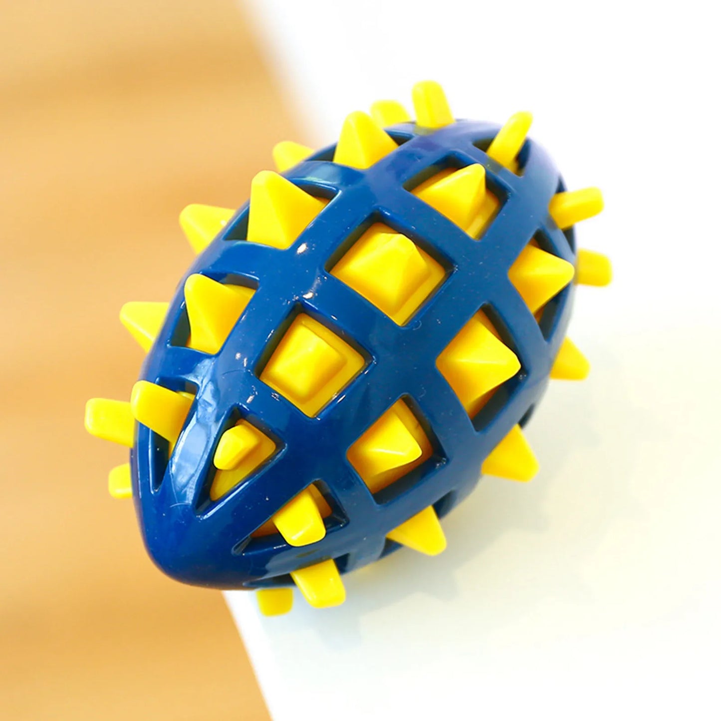 Balle pour chien bleu et jaune résistante à la mâchouille. Image produit Boutiquechien