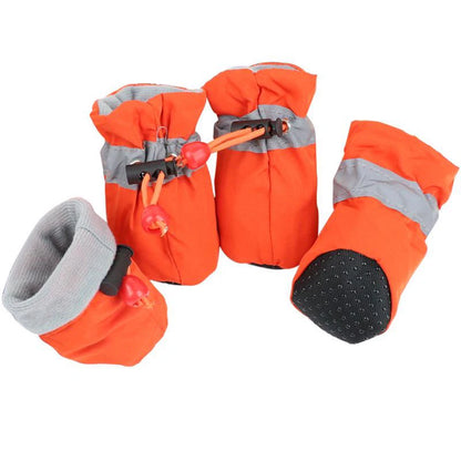 Bottes pour chiens de couleurs orange avec rembourrage gris. Les bottes servent pour les périodes hivernales. Image produit Boutiquechien