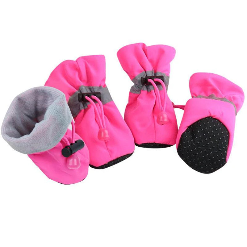 Bottes pour chiens de couleurs rose avec rembourrage gris. Les bottes servent pour les périodes hivernales. Image produit Boutiquechien
