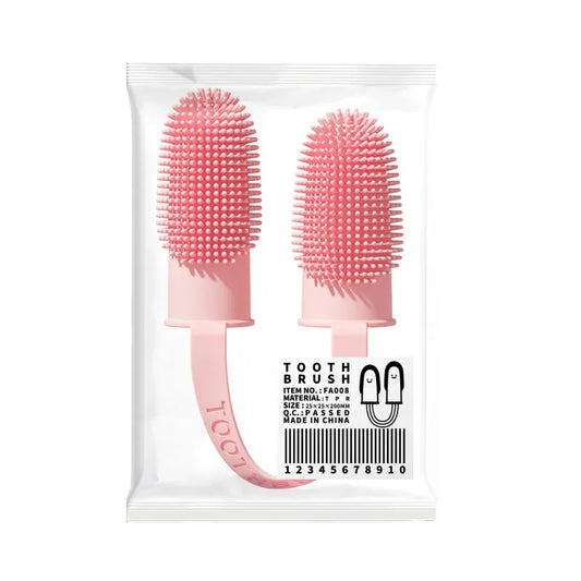 Brosse a dent double doigt de couleur rose dans un sachet plastique. Image produit Boutiquechien