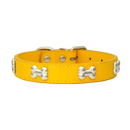Collier jaune pour chiot style cuir avec des médaillons en forme d'os parfait pour les chiots. Image produit Boutiquechien