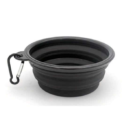 Gamelle pour chien de couleur noir pliante transportable facilement dans un fond blanc. Image produit Boutiquechien