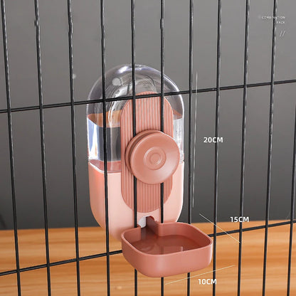 Gamelle eau de couleur rose avec toutes les dimensions sur un grillage noir. Image produit Boutiquechien