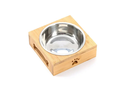 Gamelle simple en inox sur support bois avec forme de patte et d'os. Image produit Boutiquechien