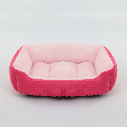 Grand panier pour chien XXL rose et rose clair rembourré pour un moelleux de qualité supérieur. Panier style velour classe pour grand chien. image produit boutiquechien